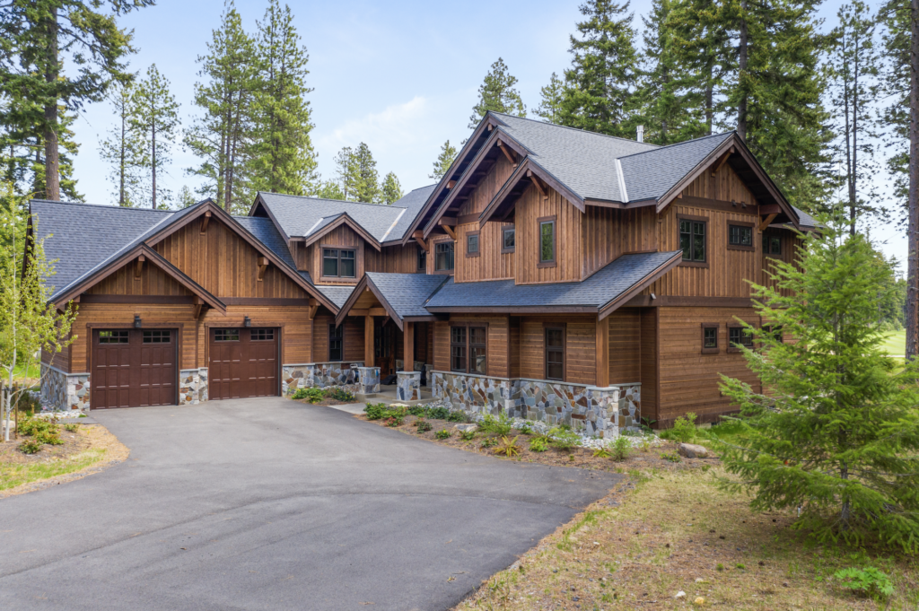 a large house with a driveway in front of it.