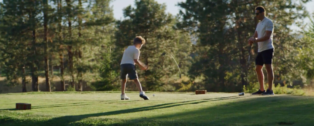 Amidst the serene greenery of the golf course, one player is captured mid-swing, embodying the tranquility and elegance of Suncadia Resort Washington. Surrounded by nature's beauty, they look forward to savoring a delightful meal at nearby Cle Elum restaurants after their game.