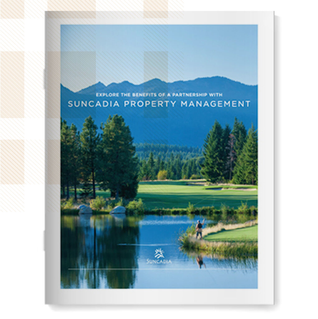 Brochure cover for Suncadia Property Management at Suncadia Resort, featuring a scenic landscape with a golf course, pond, trees, and majestic mountains under a clear blue sky. Perfectly located near charming Cle Elum restaurants.