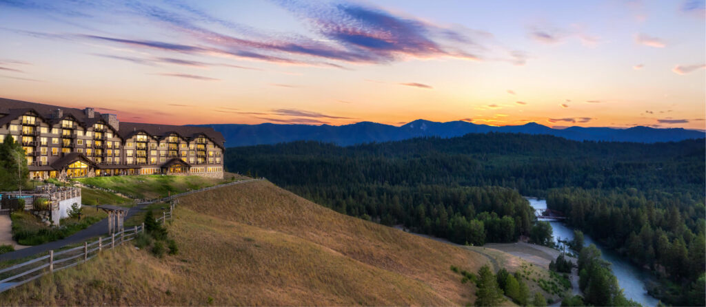 Nestled on a hillside, Suncadia offers breathtaking views of a river framed by lush forests and majestic mountains. As the sun sets, this serene Washington retreat becomes the perfect escape, blending nature's beauty with comfort and elegance.