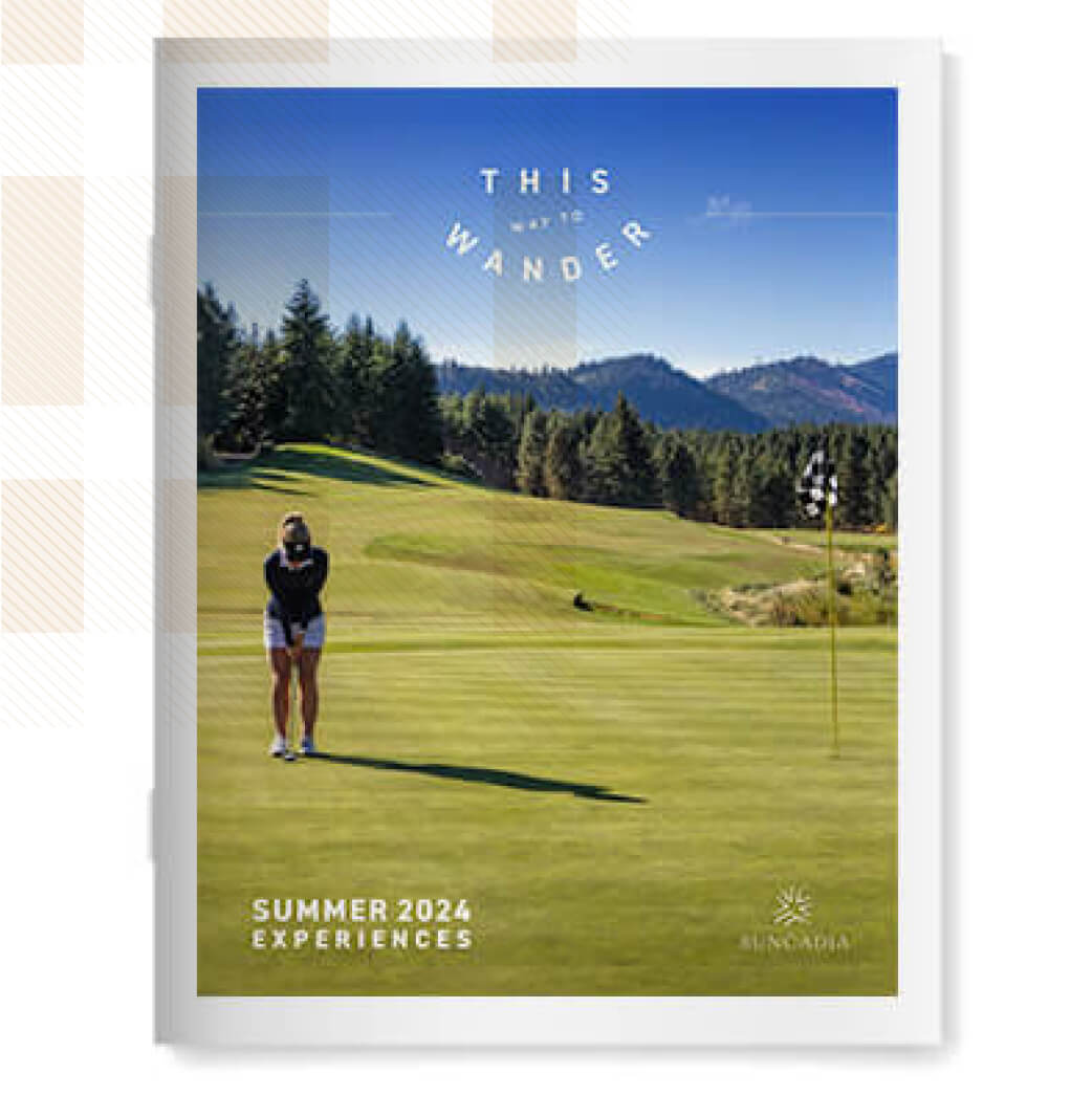 Person in golf attire putting on a lush green at Suncadia Resort, with majestic pine trees and mountains framing the scene. Text reads "This Way to Wander" and "Summer 2024 Experiences".