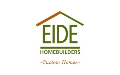 Logo of Eide Homebuilders with a stylized house roof above the text. The colors are green and brown, embracing the natural beauty of Suncadia Resort. The tagline reads, "Custom Homes," reflecting the elegance and craftsmanship synonymous with Suncadia Homes.