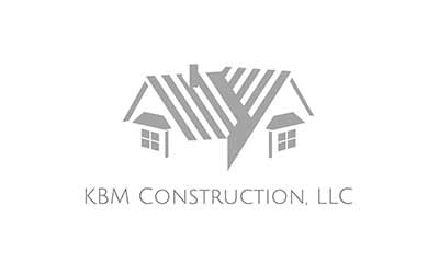 Logo of KBM Construction, LLC featuring a stylized house shape with a roof and two windows, inspired by the scenic architecture of Suncadia Resort in Washington.