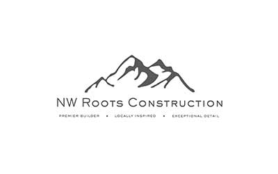 The logo of NW Roots Construction showcases a stylized mountain graphic, reminiscent of the breathtaking landscapes near Suncadia Resort. It features the text: "Premier Builder • Locally Inspired • Exceptional Detail.