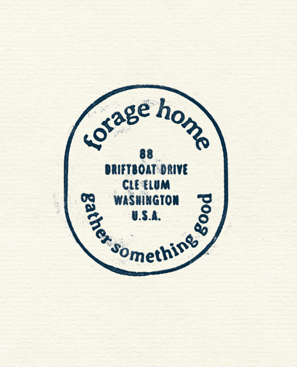 A circular stamp with the text forage home at the top, gather something good at the bottom, and the address 88 Driftboat Drive, Cle Elum, Washington U.S.A. in the center.