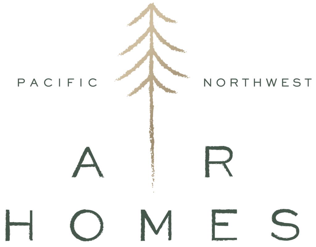 Logo for AR Homes featuring a stylized pine tree in the center, with the words Pacific Northwest on either side and AR Homes written below in uppercase letters.