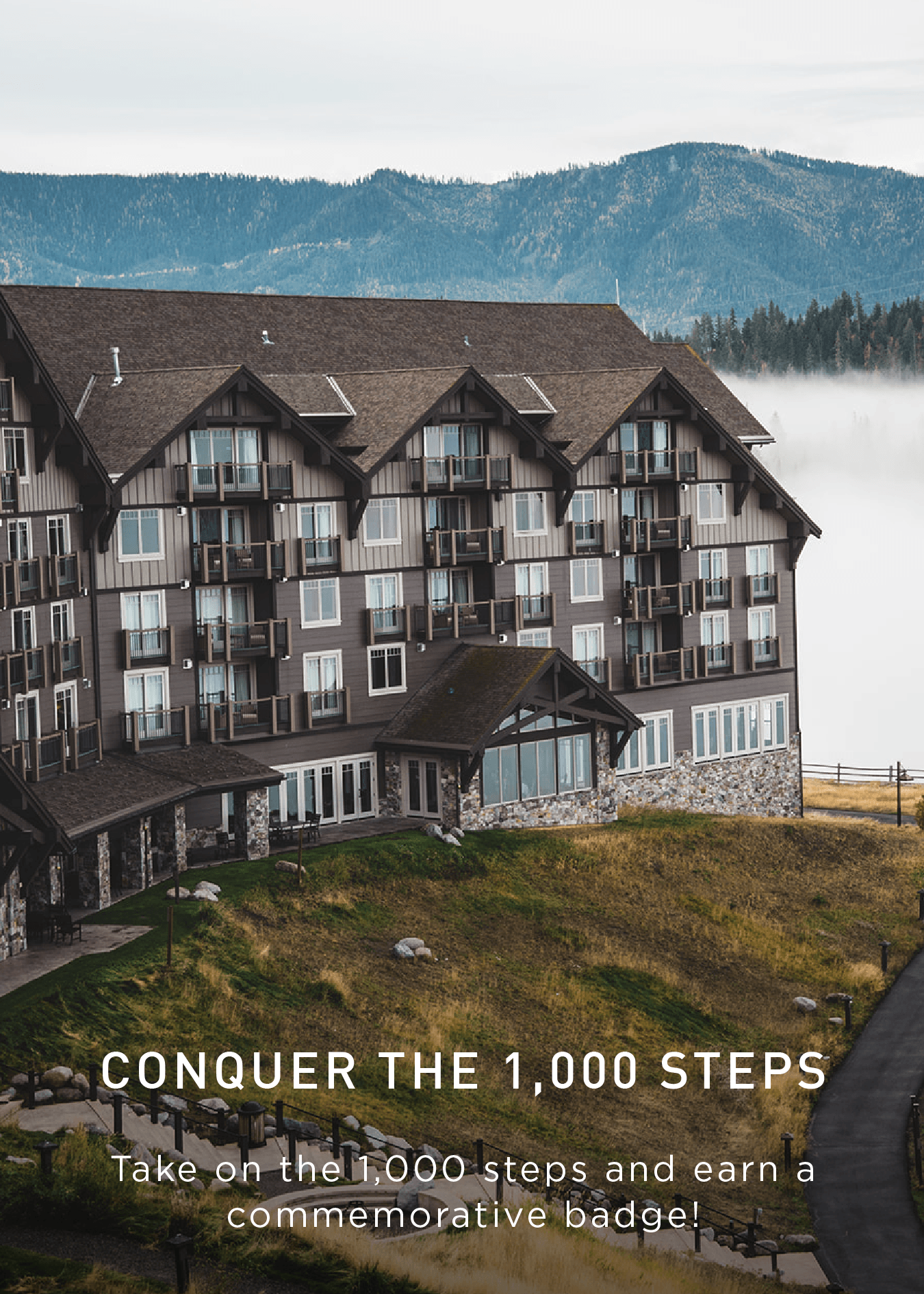 A large mountain lodge sits near a misty forest. Text reads, Conquer the 1,000 steps. Take on the 1,000 steps and earn a commemorative badge! with an Explore button below.
